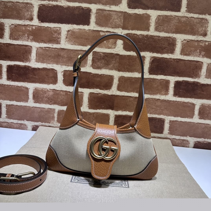 G*u*i top handle bags